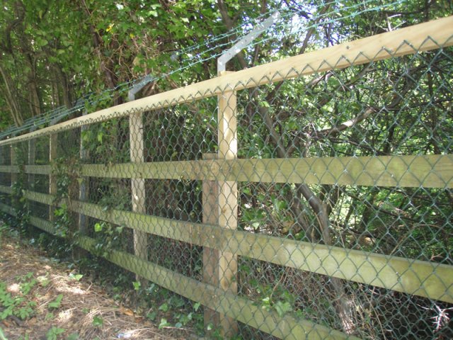 4 Bar Post & Rail Fence with Chain Link and with BWire on Galvanized Off Set Angle Iron